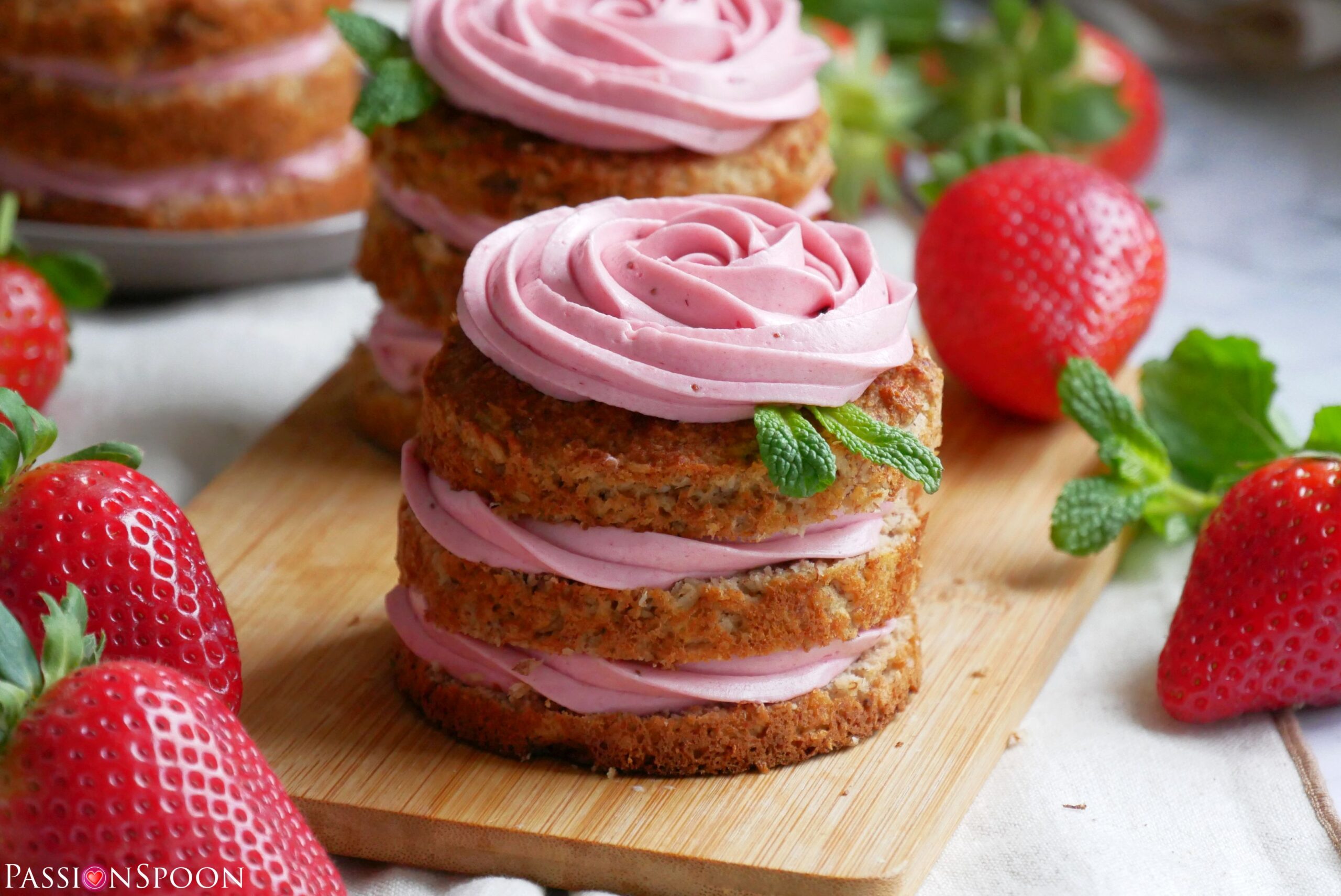https://passionspoon.com/wp-content/uploads/2023/02/strawberry-buttercream-banana-coconut-cake-scaled.jpg